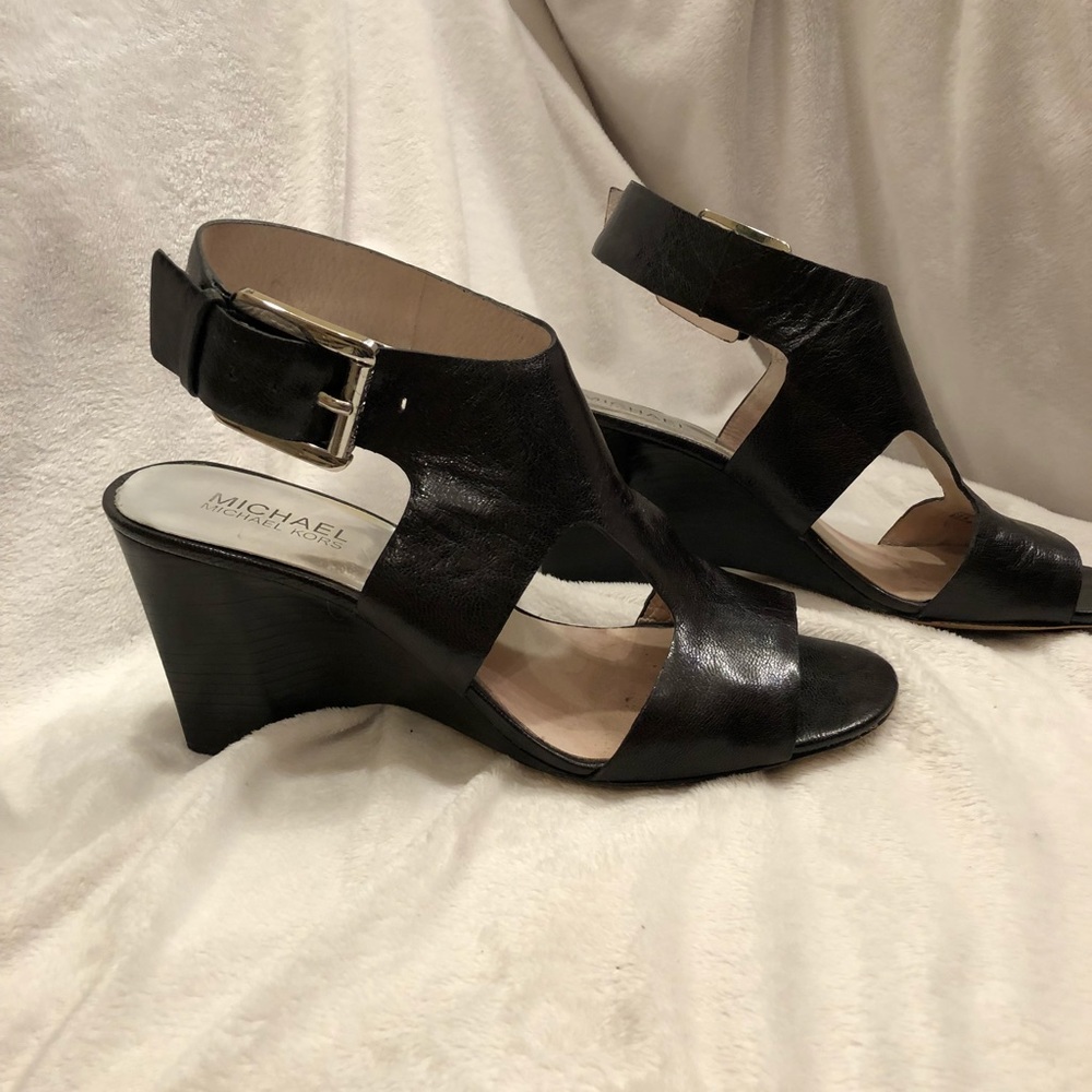 Michael Kors black leather wedge sandals.